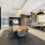 coworking space with 8-person table and two booth style tables